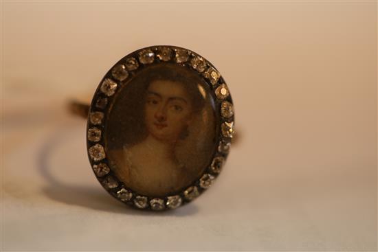A George III gold and diamond set oval portrait ring, size G/H.